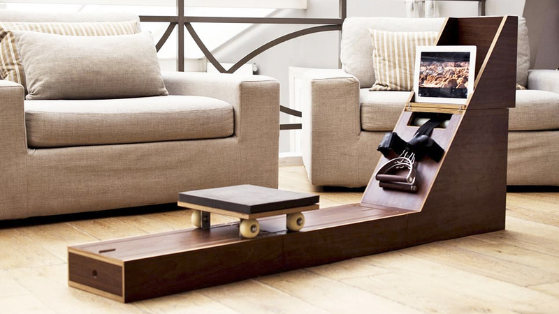 Illustration for article titled Watch This Tiny Side Table Transform Into a Full-On Rowing Machine